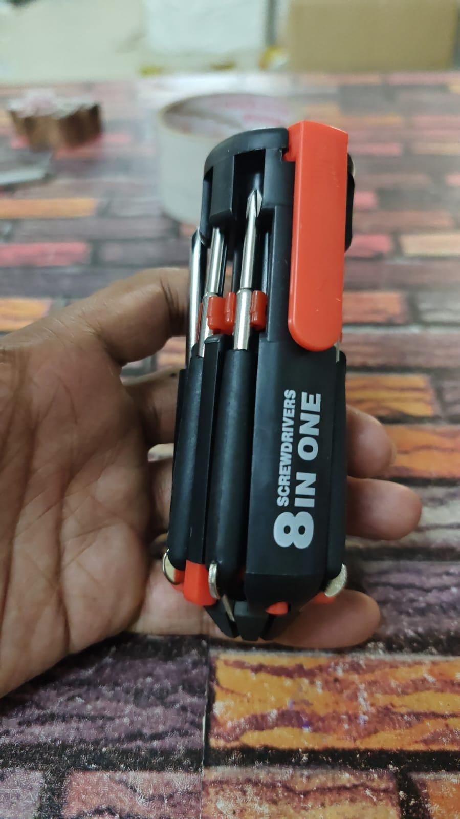 This 8-in-1 screwdriver set features interchangeable bits designed for versatility and precision. Engineered for professionals and DIY enthusiasts alike, it offers a compact solution to handle multiple screw types with ease. The durable construction ensures reliable performance, while the ergonomic handle provides optimal grip and control during use. Ideal for detailed tasks and general repairs, this tool set enhances efficiency and accuracy in every project.