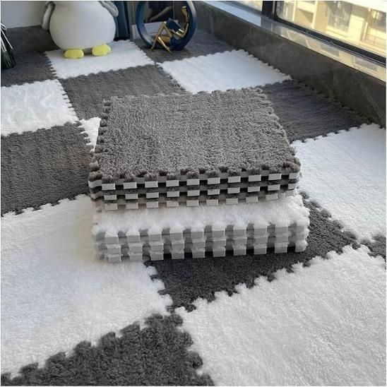 This set of six interlocking carpet tiles offers a practical and professional flooring solution. Designed for easy assembly, the tiles securely connect to create a stable, cushioned surface suitable for various environments such as offices, playrooms, or workshops. Their modular design allows for flexible arrangement and effortless replacement of individual tiles, ensuring long-term durability and convenience. Ideal for enhancing comfort and protecting floors, these carpet tiles combine functionality