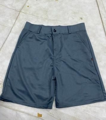 These Men's Sleek Solid Light Grey Casual Shorts offer both style and comfort. The light grey color adds a sophisticated touch, while the sleek design allows for easy movement. These shorts are perfect for everyday wear, providing a versatile look that can be dressed up or down. Made with high-quality materials, these shorts are a must-have for any wardrobe.