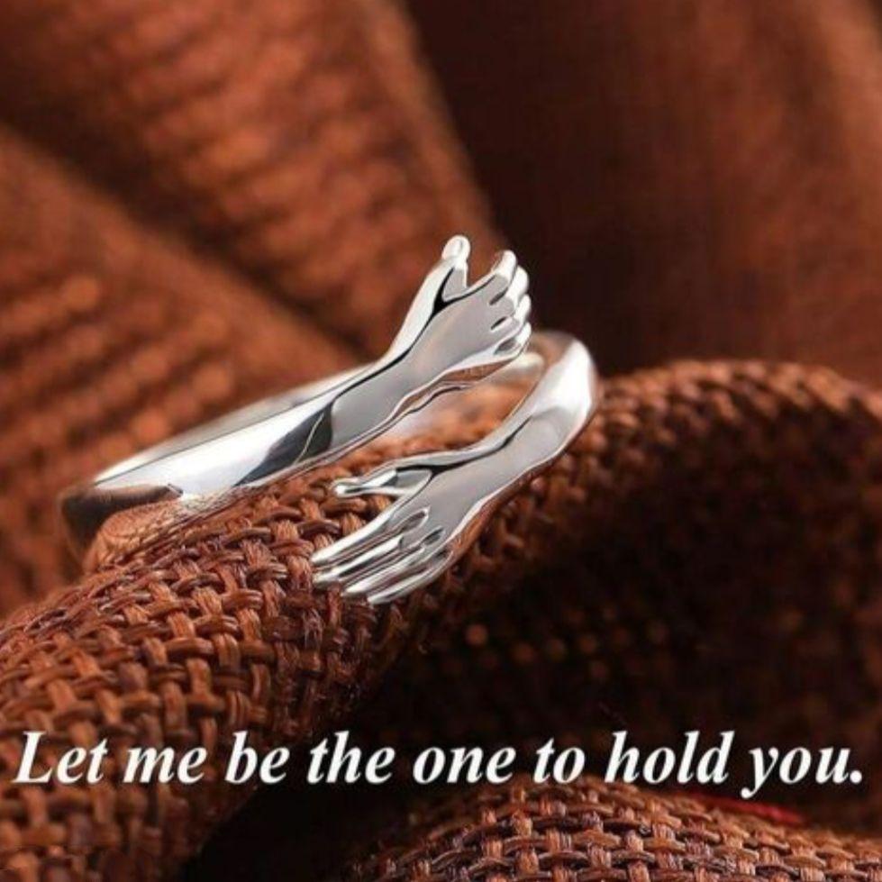 This beautiful silver plated ring symbolizes the strength and bond of friendship and loved ones. The intricate design features a hug, reminding the wearer of the love and support they have in their life. Made with high-quality materials, this ring is a perfect way to show someone you care.