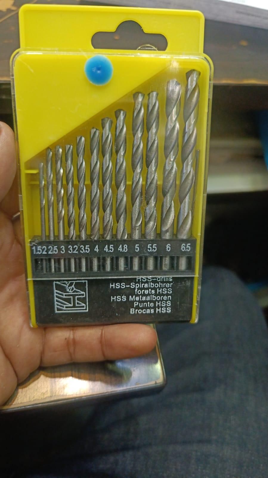 This precision-engineered 13-piece drill bit set provides versatile performance for professional and DIY applications. Constructed from heat-treated steel with optimized cutting geometries, these bits deliver clean, accurate holes in wood, metal, and plastic. The graduated size range ensures comprehensive coverage for common fastening needs, while the specialized flute design efficiently removes debris during operation. Housed in a durable case for organized storage and transport between job sites.