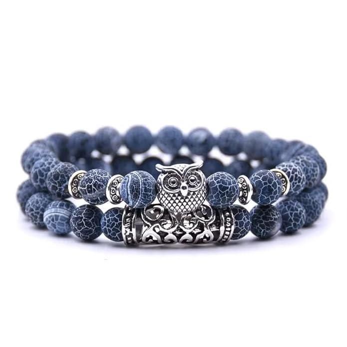 This beautiful Natural Stone Owl Bracelet is expertly crafted with high-quality natural stones that are believed to provide grounding and balance. The intricate owl design adds a touch of elegance while the stones provide potential healing and positive energy benefits. A perfect accessory for any outfit.