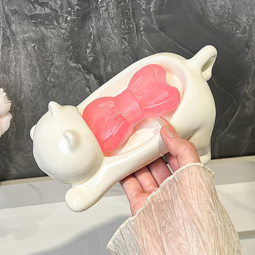 This Cat Shape Soap Holder combines functionality with feline-inspired design. Featuring strategic drainage holes to prevent water accumulation, it extends soap longevity by keeping it dry between uses. The elevated platform promotes airflow, reducing soap waste while adding a distinctive decorative element to your bathroom or kitchen space. Crafted from durable materials for long-term use in humid environments.