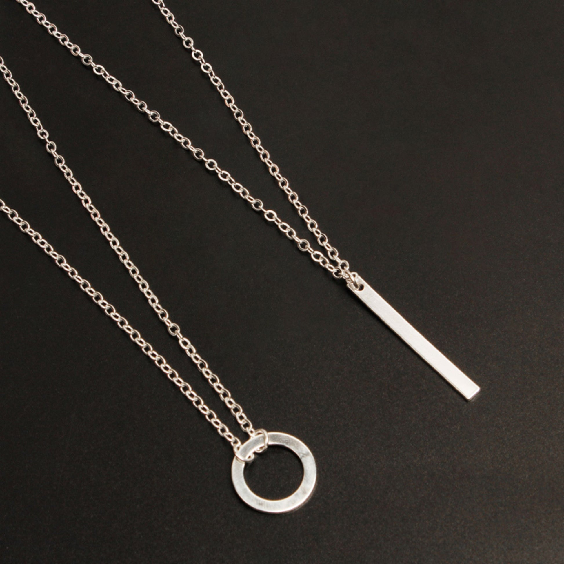 Silver Layered Chain Bar Pendant Necklace for Girls & Women

Elevate your style with this sophisticated silver layered chain bar pendant necklace. Featuring multiple delicate chains and a minimalist bar pendant, this versatile accessory transitions effortlessly from casual to formal occasions. Precision-crafted for durability and designed specifically to complement both youthful and mature aesthetics.