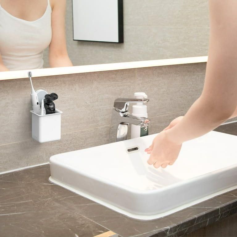 This ergonomically designed Tooth Brush Holder provides optimal storage for oral hygiene implements while preventing bacterial transfer between brushes. The specialized compartments maintain separation for enhanced sanitation, while the robust base construction ensures countertop stability. Its space-efficient architecture maximizes bathroom organization without compromising functionality, ultimately extending brush longevity through proper ventilation and positioning.