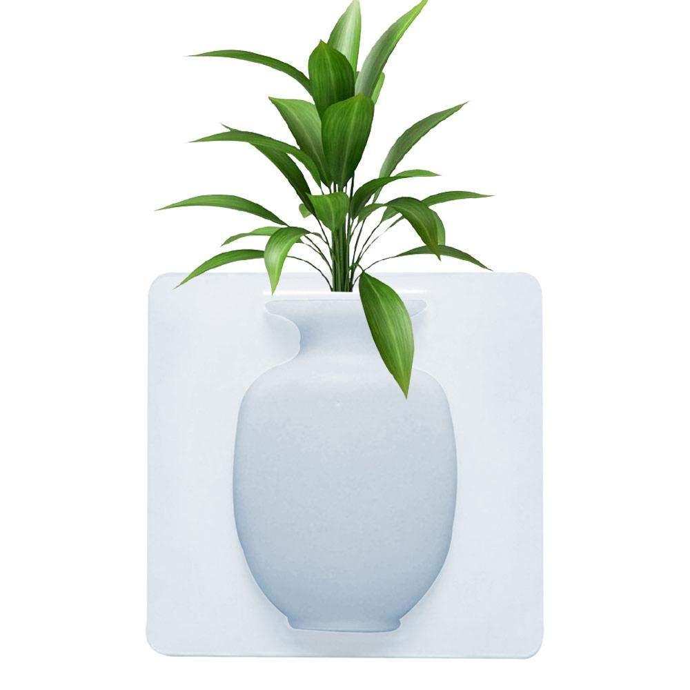 This wall-mounted silicone vase offers a versatile and modern solution for displaying flowers or small plants. Crafted from flexible, durable silicone, it adheres securely to smooth surfaces without the need for drilling or hardware. Its removable design allows easy repositioning and cleaning, making it ideal for enhancing any room with minimal effort. Perfect for adding a touch of greenery in compact spaces, this sticky vase combines functionality with sleek aesthetics for expert-level home decor.