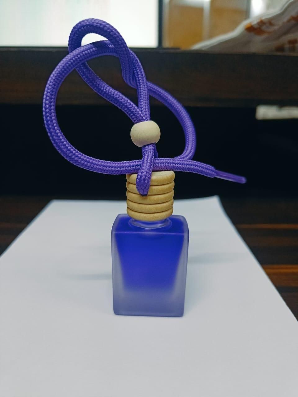 This Hanging Car Perfume Pods Diffuser offers a convenient way to keep your vehicle smelling fresh. Featuring a single assorted perfume pod, it easily hangs inside your car and gradually releases a balanced fragrance that neutralizes unwanted odors. Its compact design ensures it blends seamlessly with your car’s interior while providing long-lasting scent diffusion for a pleasant driving environment.