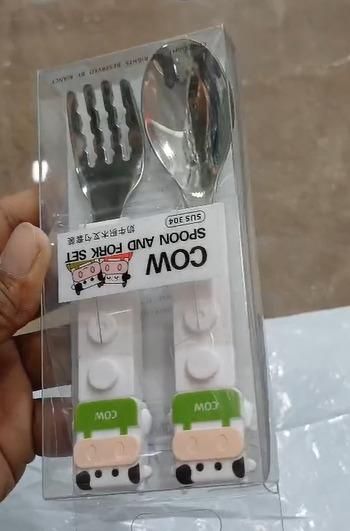 The Cow Shaped Grip Spoon and Fork set offers a unique blend of whimsical design and ergonomic functionality. Crafted to fit comfortably in hand, the cow-shaped handles provide a secure grip, enhancing control during use. Made from durable materials, this set is easy to clean and ideal for both children and adults seeking a practical yet charming dining experience. Perfect for everyday meals or as a distinctive gift.