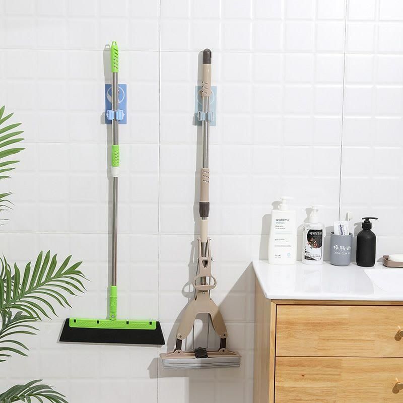 Keep your cleaning tools organized and easily accessible with this pack of 2 wall-mounted mop and broom holders. Designed with a playful cartoon style, these holders securely grip your mops and brooms, preventing clutter and saving floor space. Easy to install and durable, they provide a practical solution for maintaining a tidy and efficient cleaning area. Ideal for homes or workplaces seeking both functionality and a touch of fun in storage.