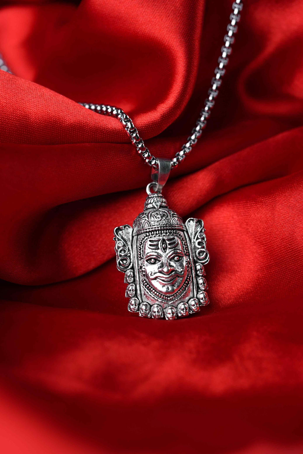 Silver Mahakal Pendant WIth Chain

Crafted with precision, this Silver Mahakal Pendant With Chain combines spiritual significance with elegant craftsmanship. The detailed Mahakal design showcases expert silverwork, making it both a meaningful religious symbol and a sophisticated accessory. Comes complete with a matching chain for immediate wear.