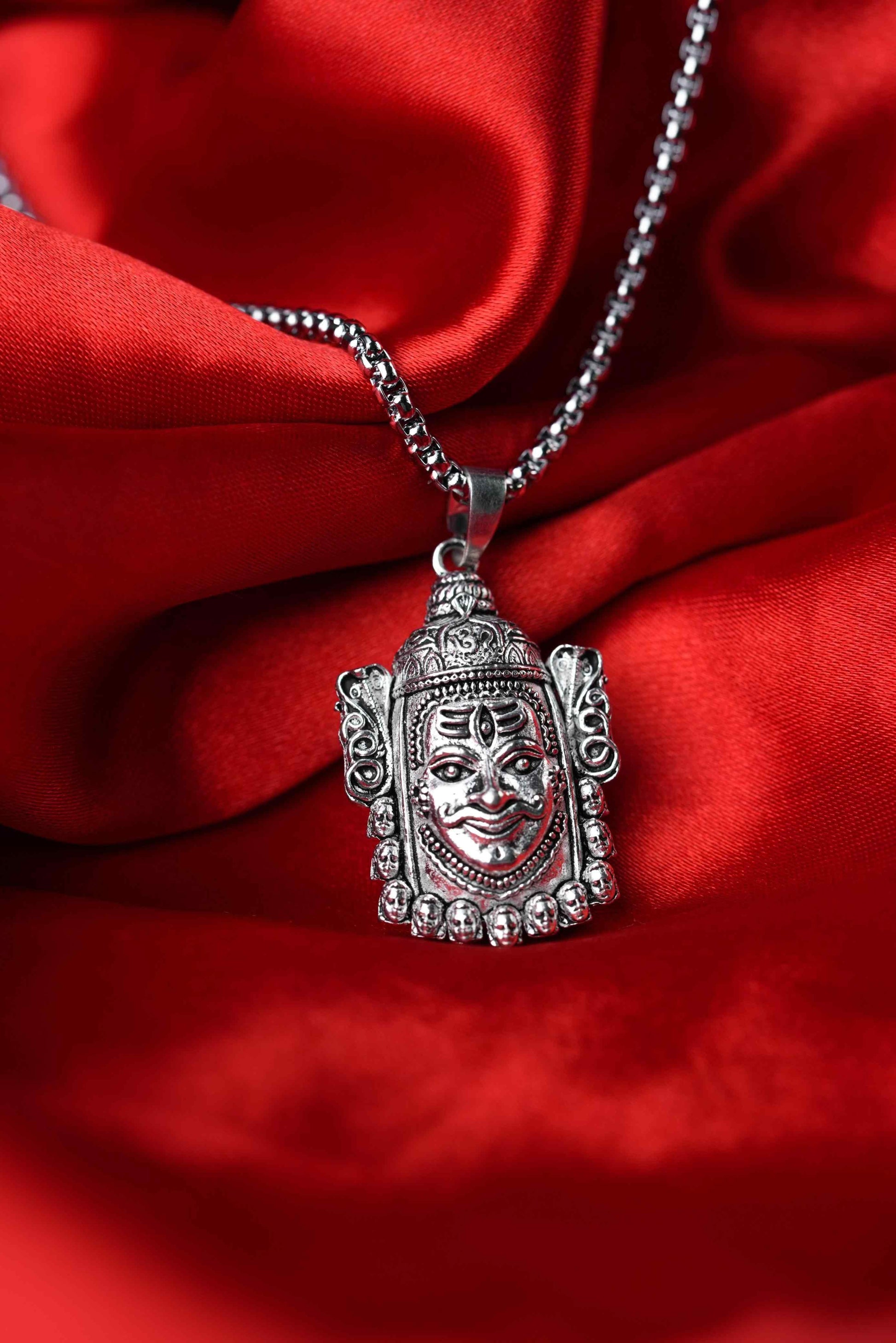Silver Mahakal Pendant WIth Chain

Crafted with precision, this Silver Mahakal Pendant With Chain combines spiritual significance with elegant craftsmanship. The detailed Mahakal design showcases expert silverwork, making it both a meaningful religious symbol and a sophisticated accessory. Comes complete with a matching chain for immediate wear.