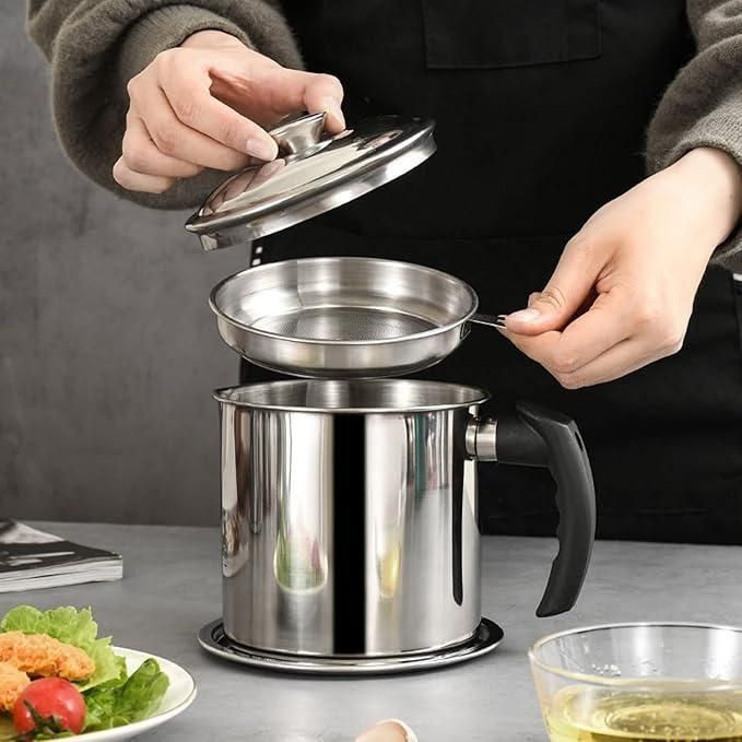 This convenient stainless steel oil pot combines durability with functionality for your everyday cooking needs. The integrated filter removes food particles while pouring, ensuring clean oil every time. The tight-fitting lid prevents contamination and oxidation, extending the life of your cooking oils. A practical addition to any kitchen that helps reduce mess and waste.