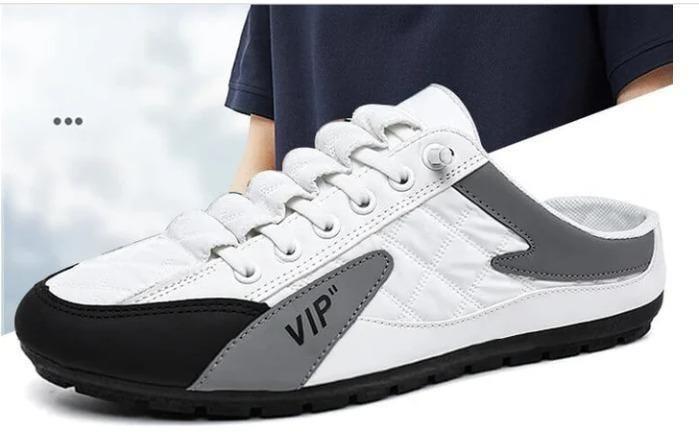 Expertly crafted men's white half casual shoes combining contemporary design with exceptional comfort. The versatile silhouette transitions seamlessly from casual outings to semi-formal occasions. Premium materials ensure durability while the ergonomic footbed provides all-day support. The clean white finish offers effortless styling with virtually any outfit.