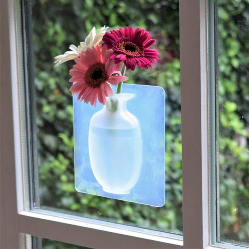 This wall-mounted silicone vase offers a versatile and modern solution for displaying flowers or small plants. Crafted from flexible, durable silicone, it adheres securely to smooth surfaces without the need for drilling or hardware. Its removable design allows easy repositioning and cleaning, making it ideal for enhancing any room with minimal effort. Perfect for adding a touch of greenery in compact spaces, this sticky vase combines functionality with sleek aesthetics for expert-level home decor.