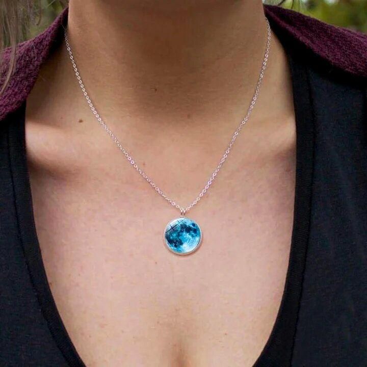 Introducing our new glowing moon necklace! With advanced technology, this necklace radiates a luminous glow to enhance your style. Experience the beauty of the night sky with this unique accessory. Made with quality materials for a lasting shine. Upgrade your jewelry collection with our New Glowing Moon Necklace.