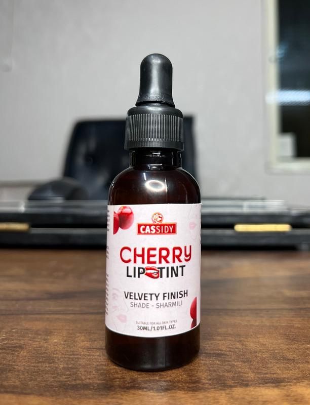 CASSIDY Cherry LipTint delivers professional-grade color retention with its advanced pigment technology. This convenient pack of two 30 ml bottles ensures extended usage while maintaining consistent application quality. The specialized formula bonds with lip tissue for remarkable longevity, resisting transfer and fading throughout daily activities. 