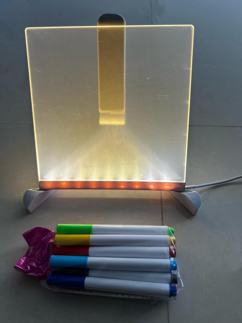 The 3D LED Light Glass Acrylic Writing Pad merges advanced illumination technology with practical functionality. Featuring precision-engineered acrylic construction, this writing surface utilizes edge-lit LED technology to provide optimal visibility in any environment. The transparent design creates a floating text effect while maintaining structural integrity for daily use. Ideal for professionals requiring both technical performance and aesthetic sophistication in their workspace tools.