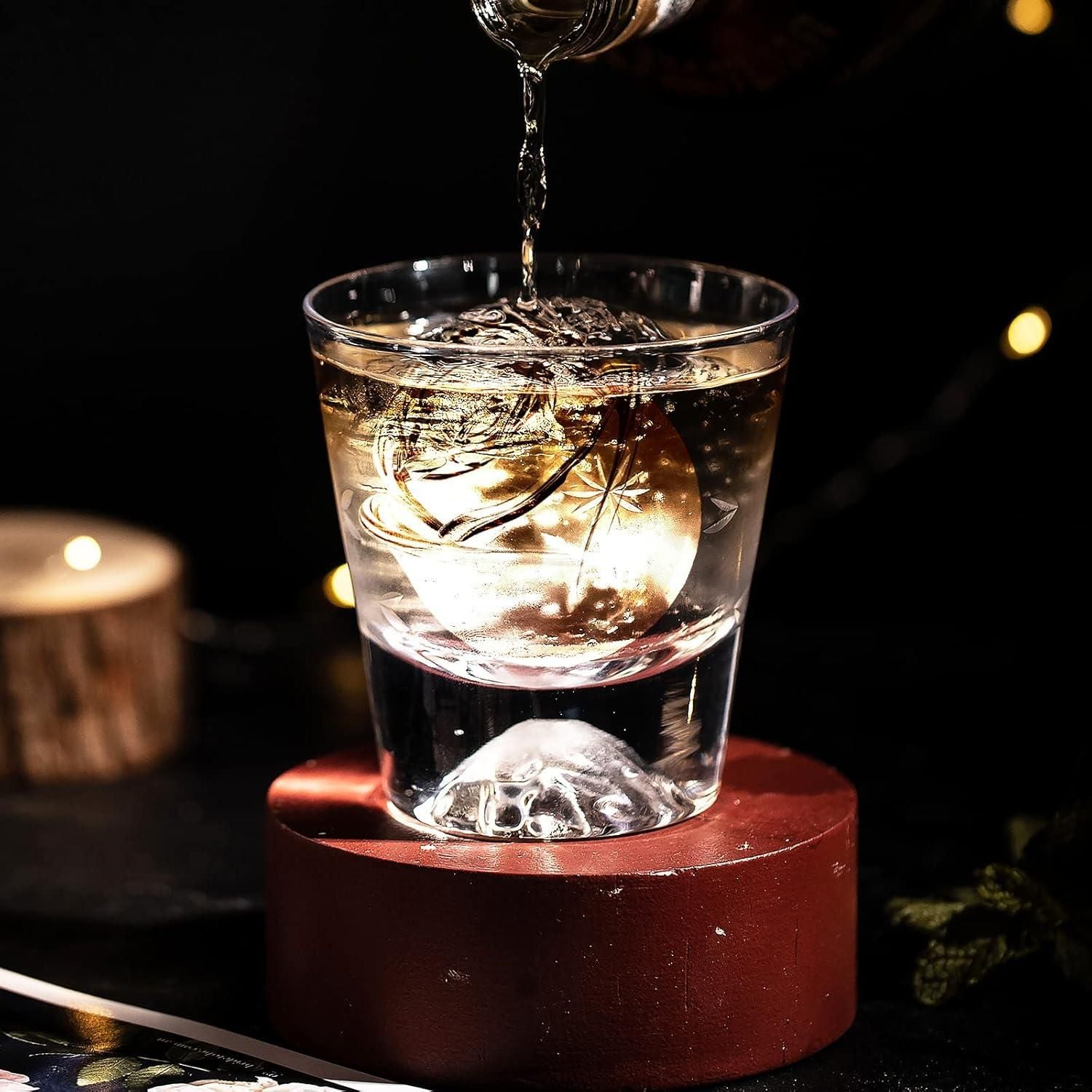 Transform your beverages into works of art with our Rose Ice Lattice Mould. This easy-to-use silicone mould creates stunning rose-shaped ice cubes that add elegance to any drink. The unique lattice design ensures slower melting, keeping your beverages chilled without diluting them quickly. We're confident you'll love how these decorative ice roses elevate both everyday refreshments and special occasions.