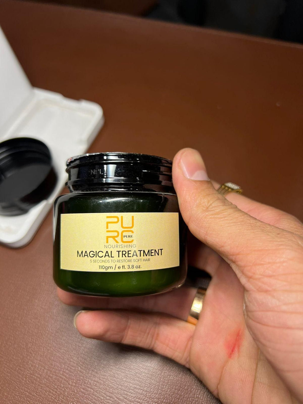 This professional-grade PURE MAGICAL TREATMENT delivers remarkable hair restoration in just 5 seconds. The specialized formula penetrates hair shafts to repair damage and restore natural softness. Each value pack contains two 110gm containers, providing sufficient product for multiple applications. The concentrated treatment addresses dryness, brittleness, and frizz while improving overall hair texture and manageability. Clinically formulated for optimal results across all hair types.