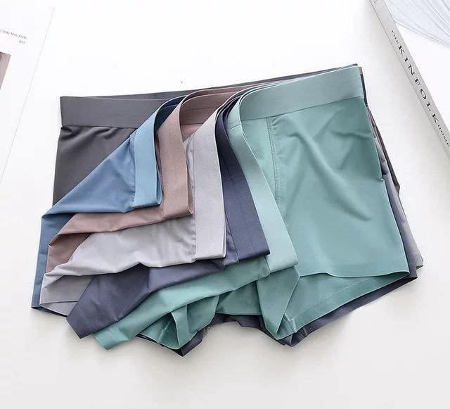 Introducing our Men's Ice Silk Briefs Boxers, designed for ultimate comfort and breathability. Made with premium ice silk material, these boxers provide a smooth and cooling sensation, perfect for everyday wear. Available in a pack of 5, these boxers offer superior value and style. Experience the luxury of ice silk today.