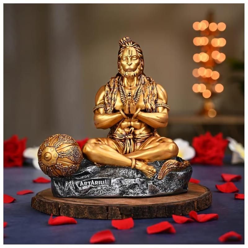 This exquisitely detailed Mahabali Lord Hanuman Ji Statue represents the epitome of devotion and strength in Hindu iconography. Sculpted with precision to capture the divine essence of the Vanara god, it features traditional attributes including his powerful stance and benevolent expression. An authentic devotional piece that serves as both a spiritual focal point and an artistic masterpiece for worship spaces.