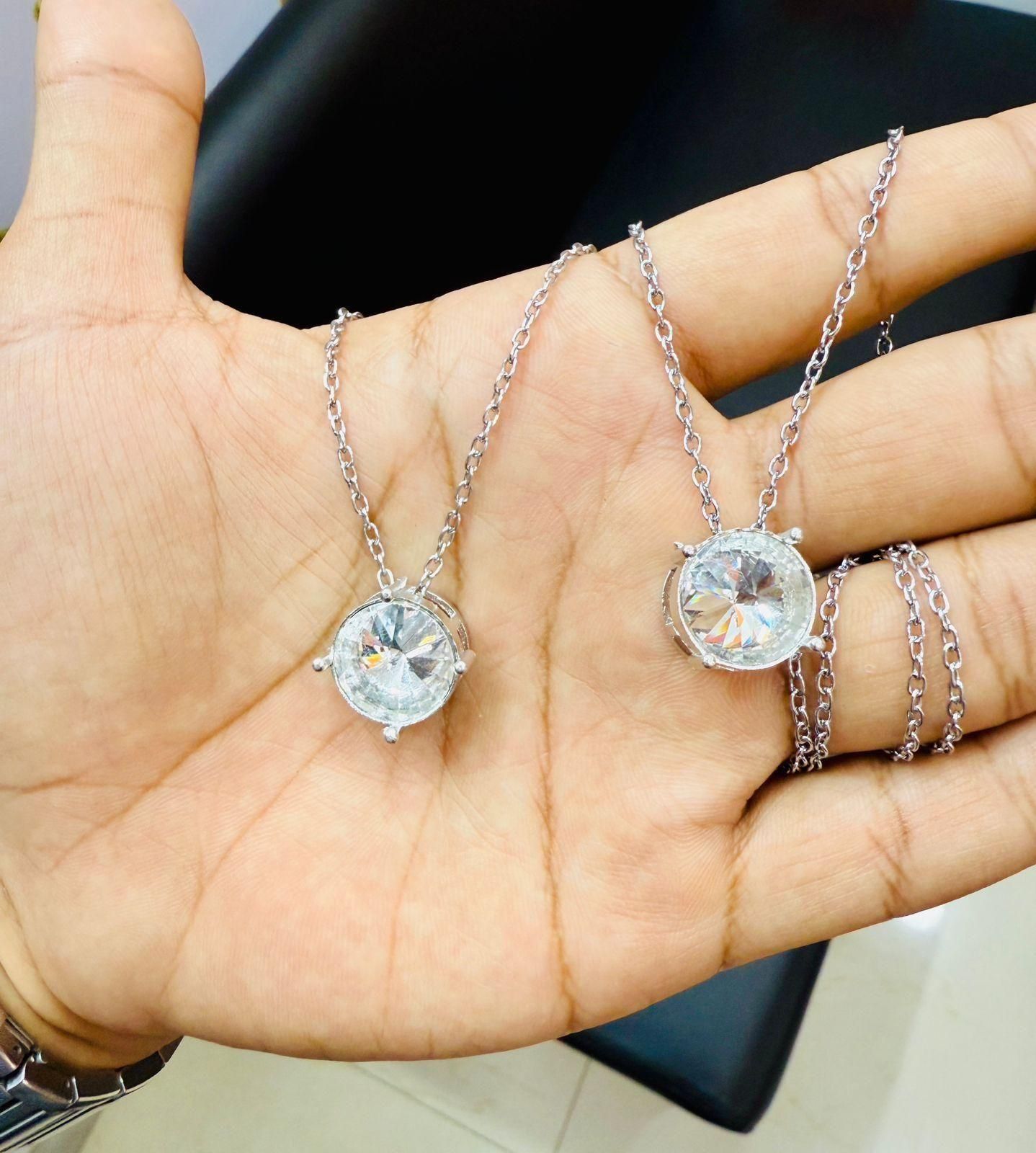 This elegant silver necklace features a specialized weight loss stone believed to support metabolism and energy balance. Crafted with precision, the pendant rests at an optimal position to maximize contact with energy centers. The durable silver chain ensures longevity while complementing any outfit, making it both a functional wellness accessory and a sophisticated jewelry piece.