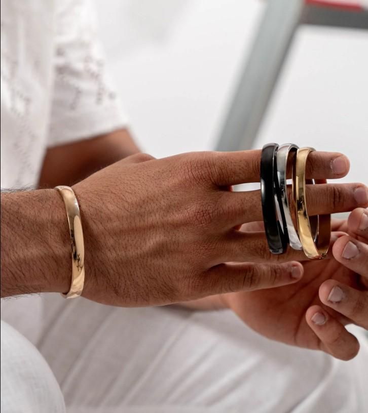 Precision-crafted stainless steel kada bracelet designed specifically for men seeking durability with style. This corrosion-resistant accessory maintains its luster through daily wear while providing a substantial yet comfortable fit. The classic kada design offers a sophisticated statement piece that transitions seamlessly from casual to formal occasions.