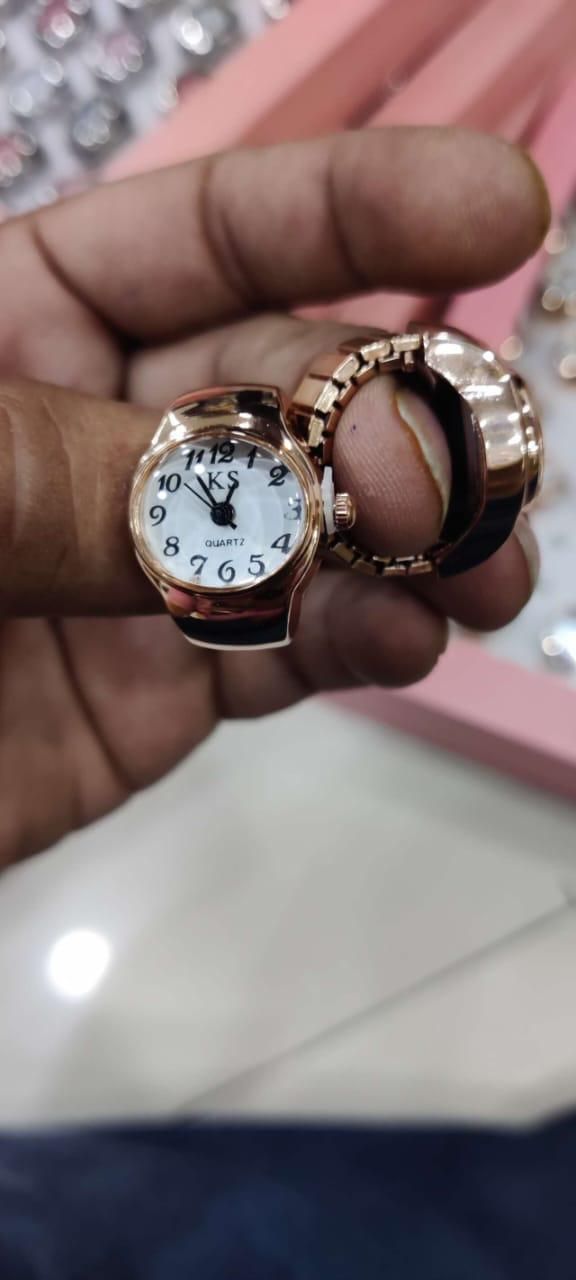 Women's Men's Ring Watch Analogue Quartz on Finger Watch Ring
This precision-crafted Analogue Quartz Ring Watch combines functionality with fashion, offering a sophisticated timepiece that sits elegantly on your finger. Designed for both women and men, this innovative accessory features reliable quartz movement for accurate timekeeping while eliminating the need for a traditional wristwatch. Its versatile design makes it an excellent statement piece for any occasion.