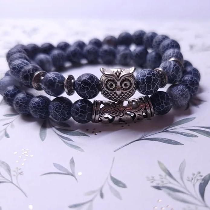 This beautiful Natural Stone Owl Bracelet is expertly crafted with high-quality natural stones that are believed to provide grounding and balance. The intricate owl design adds a touch of elegance while the stones provide potential healing and positive energy benefits. A perfect accessory for any outfit.