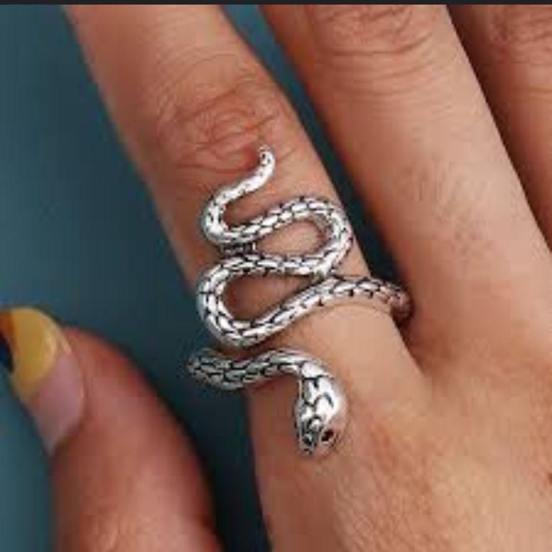Silver and Black Color Snake Ring For Men and Women

This meticulously crafted Silver and Black Color Snake Ring features a striking dual-tone design suitable for both men and women. The precision-detailed serpentine motif combines elegant silver with contrasting black accents, creating a sophisticated statement piece that complements diverse styles. Versatile enough for daily wear yet distinctive for special occasions.