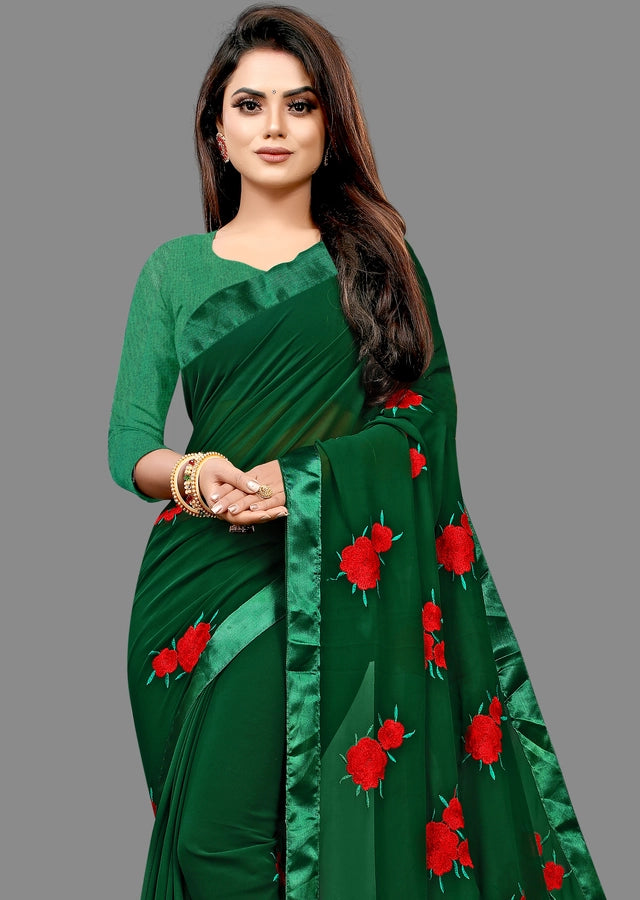 Crafted from premium georgette fabric, this bottle green saree features delicate embroidery that enhances its sophisticated appeal. With a generous length of 6.3 meters, it allows for elegant draping and versatile styling options. Lightweight and breathable, the saree ensures comfort throughout extended wear, making it an excellent choice for formal events and celebrations. Its rich color and intricate detailing reflect expert craftsmanship, perfect for those seeking a timeless and refined ethnic ensemble.