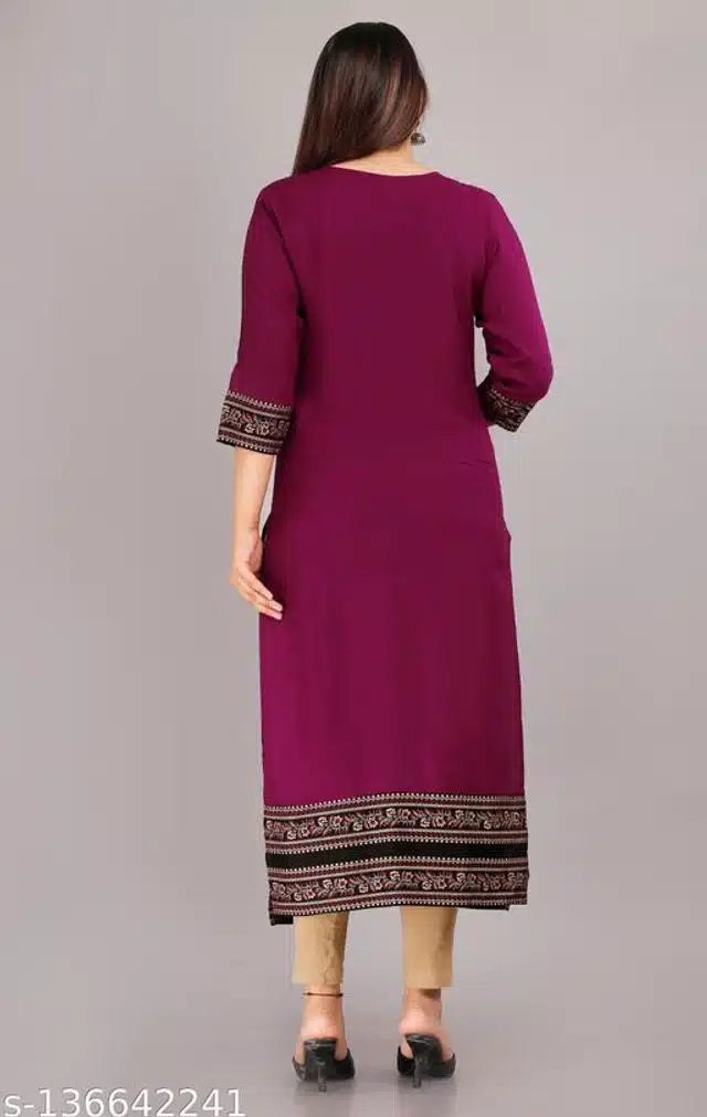 This purple rayon kurti features intricate embroidery, combining traditional craftsmanship with modern style. Designed for a comfortable fit in size XXS, it offers breathable fabric ideal for daily wear or festive occasions. Its elegant design enhances your wardrobe with a touch of sophistication and cultural charm.