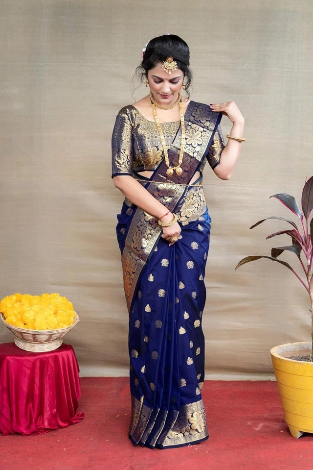 This Banarasi Silk Saree in a deep purple shade showcases exquisite woven craftsmanship over its 6.3-meter length. Made from premium silk, it offers a smooth texture and elegant drape, embodying traditional artistry with a refined finish. Ideal for formal occasions, this saree enhances your wardrobe with its rich heritage and sophisticated design.