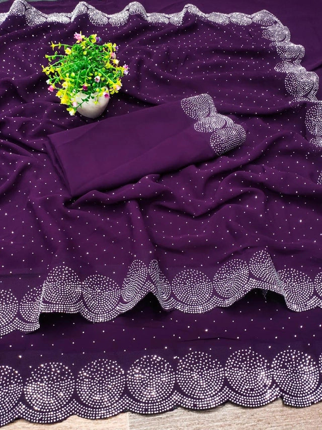 Crafted from premium georgette fabric, this 6.3-meter red saree is adorned with intricate embellishments that elevate its elegance. The lightweight material ensures a comfortable drape, while the detailed work adds a sophisticated charm, perfect for formal events and traditional celebrations. Its rich color and refined texture make it a timeless addition to any wardrobe.