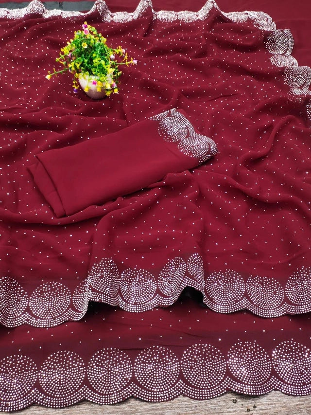 Crafted from premium georgette fabric, this 6.3-meter red saree is adorned with intricate embellishments that elevate its elegance. The lightweight material ensures a comfortable drape, while the detailed work adds a sophisticated charm, perfect for formal events and traditional celebrations. Its rich color and refined texture make it a timeless addition to any wardrobe.