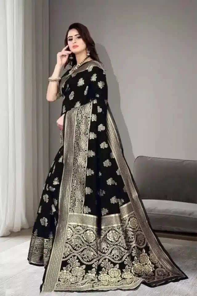 This black jacquard saree, measuring 6.3 meters, showcases exquisite foil printing that enhances its luxurious texture. Designed for women who appreciate fine craftsmanship, it offers a perfect balance of traditional elegance and modern sophistication. The high-quality fabric ensures comfortable wear and graceful draping, making it ideal for special occasions and formal events.