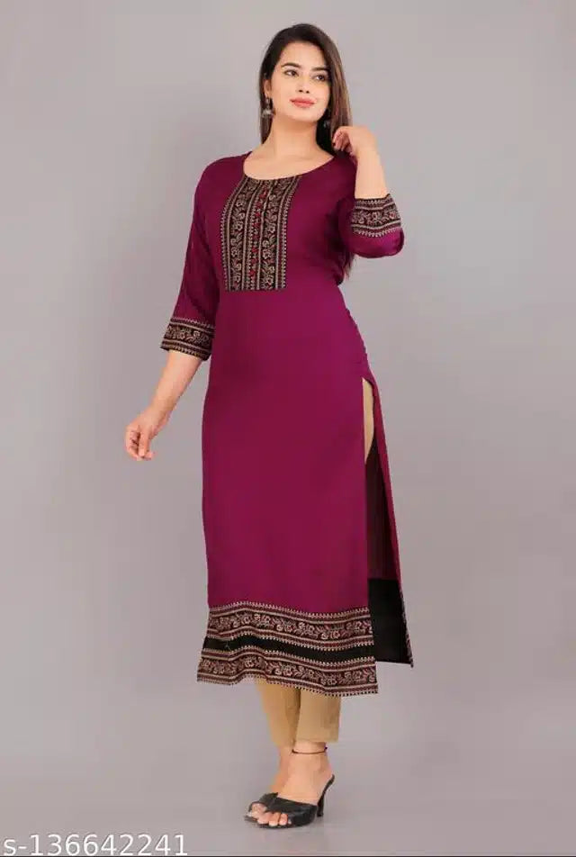 This purple rayon kurti features intricate embroidery, combining traditional craftsmanship with modern style. Designed for a comfortable fit in size XXS, it offers breathable fabric ideal for daily wear or festive occasions. Its elegant design enhances your wardrobe with a touch of sophistication and cultural charm.