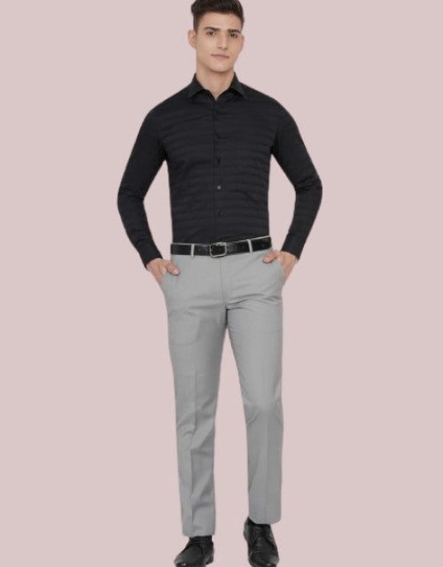 Solid Mid-Rise Stretchable Men's Formal Trousers

Expertly tailored formal trousers featuring a comfortable mid-rise fit with premium stretchable fabric that adapts to your movements while maintaining a professional silhouette. Available in multiple sizes to ensure the perfect fit for every professional occasion. The versatile design transitions seamlessly from office meetings to evening functions.