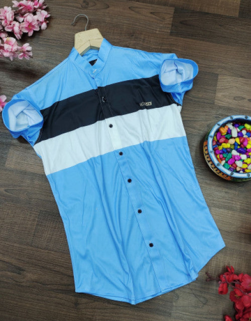 This Men's Regular, Super Slim Fit Color Block Mandarin Collar Casual Shirt offers a sleek and modern look. The slim fit cut complements the color block design, while the mandarin collar adds a touch of sophistication. Perfect for any casual event, this shirt provides a stylish and comfortable option for the fashion-conscious man.