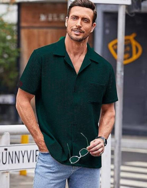 This Men's Checkered Casual Shirt boasts a relaxed fit and a spread collar, perfect for a comfortable and stylish look. Made with high-quality materials, it offers a versatile and durable addition to any wardrobe. Elevate your casual outfit game with this must-have shirt.