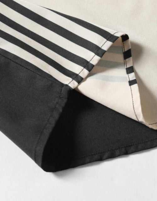 Discover the ultimate blend of style and comfort with our Men Relaxed Fit Striped Spread Collar Casual Shirt. Made from high-quality materials, this shirt features a relaxed fit and a classic striped design, perfect for any casual occasion. Elevate your wardrobe and feel confident all day long.
