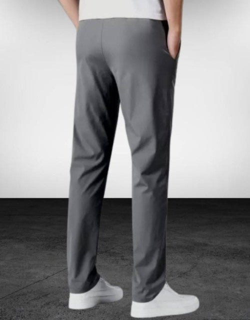 Stay comfortable and stylish with our Men Solid Black and Grey Track Pants. These track pants come in a pack of 2, perfect for your daily routine. Made with high-quality fabric, they offer superior comfort and durability. Upgrade your wardrobe with these versatile and practical track pants.