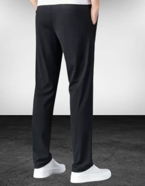 Stay comfortable and stylish with our Men Solid Black and Grey Track Pants. These track pants come in a pack of 2, perfect for your daily routine. Made with high-quality fabric, they offer superior comfort and durability. Upgrade your wardrobe with these versatile and practical track pants.