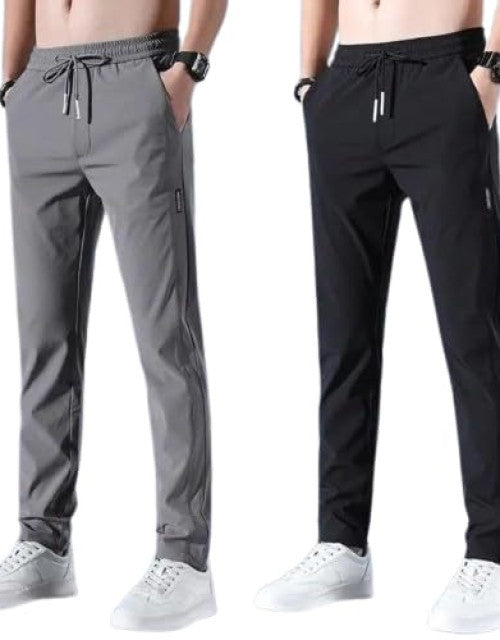 These Men Solid Black and Grey Track Pants come in a convenient pack of two. Made from high-quality fabric, they offer comfort and style for any workout or casual outing. The solid black and grey colors provide both versatility and a sleek look. Upgrade your wardrobe with these fashionable track pants.