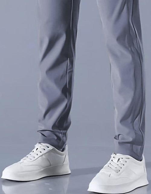 These Men Solid Grey Track Pants are a comfortable and stylish choice for any active man. Made from high-quality materials, these track pants offer a perfect fit and durability. With a solid grey color, they can easily match any workout top or loungewear. Stay comfortable and confident during your workouts with these track pants.