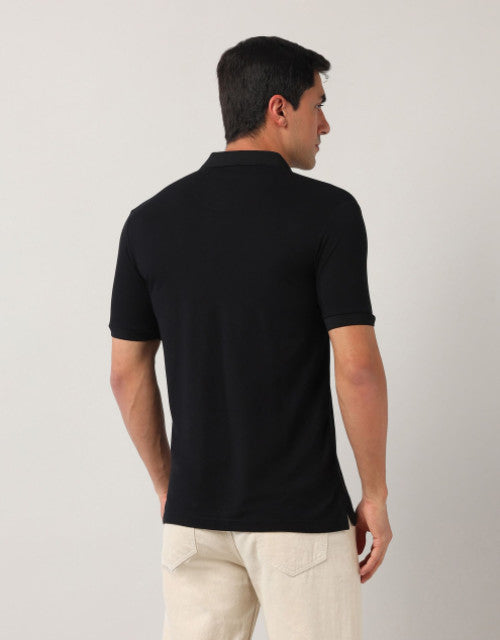 Crafted with high-quality, breathable cotton, our Men Solid Polo Collar T-shirt offers both comfort and style. The classic polo collar adds a touch of sophistication while the durable fabric ensures long-lasting wear. Perfect for any casual or formal occasion, this T-shirt is a versatile and essential addition to any wardrobe.