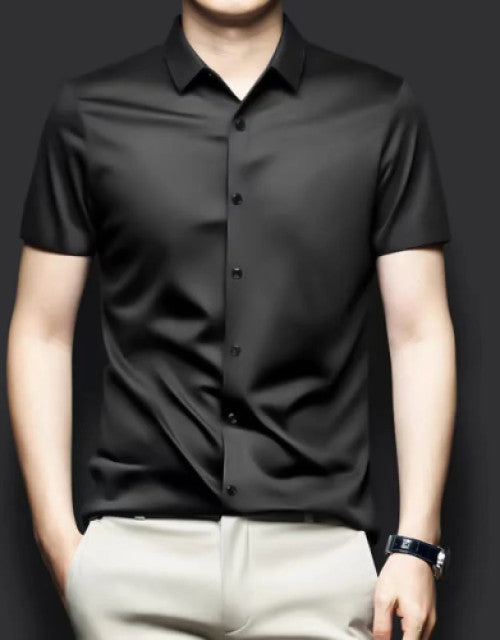 This Men's Half Sleeve Regular Fit Solid Satin Formal Shirt is perfect for any professional setting. With its sleek design and comfortable fit, it is a must-have for any man's wardrobe. Made from high-quality satin fabric, it offers a polished and sophisticated look. Upgrade your formal wear with this essential piece.