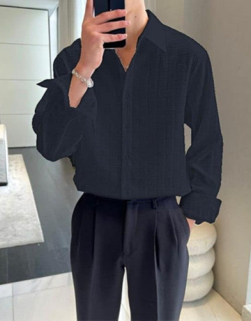 Expertly crafted with a cotton blend, this men's long sleeve shirt offers a comfortable and regular fit. Perfect for any occasion, this classic shirt is versatile and stylish. The blend of cotton ensures breathability and softness while the regular fit provides a flattering silhouette.