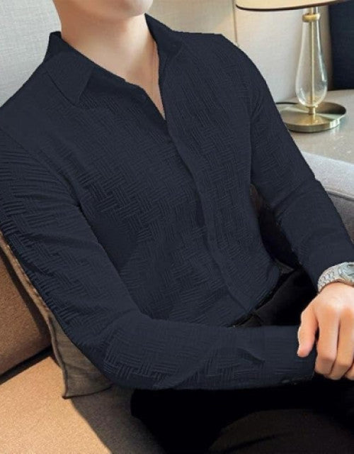 Expertly crafted with a cotton blend, this men's long sleeve shirt offers a comfortable and regular fit. Perfect for any occasion, this classic shirt is versatile and stylish. The blend of cotton ensures breathability and softness while the regular fit provides a flattering silhouette.