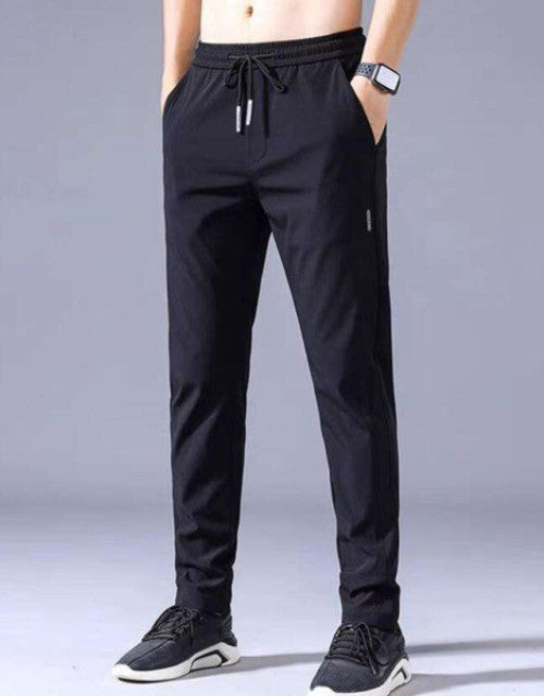 Upgrade your workout wardrobe with these Men's Solid Track Pants. Made with high-quality materials, these pants provide complete comfort and flexibility during any physical activity. With a pack of two, you'll always have a clean pair ready when you need it. Perfect for any active lifestyle.